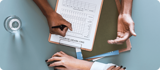Doctor using laptop for prescription drafting